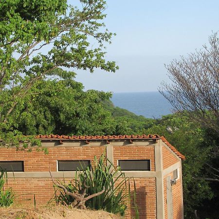 Centro Sati Bungalow Cuatunalco Buitenkant foto